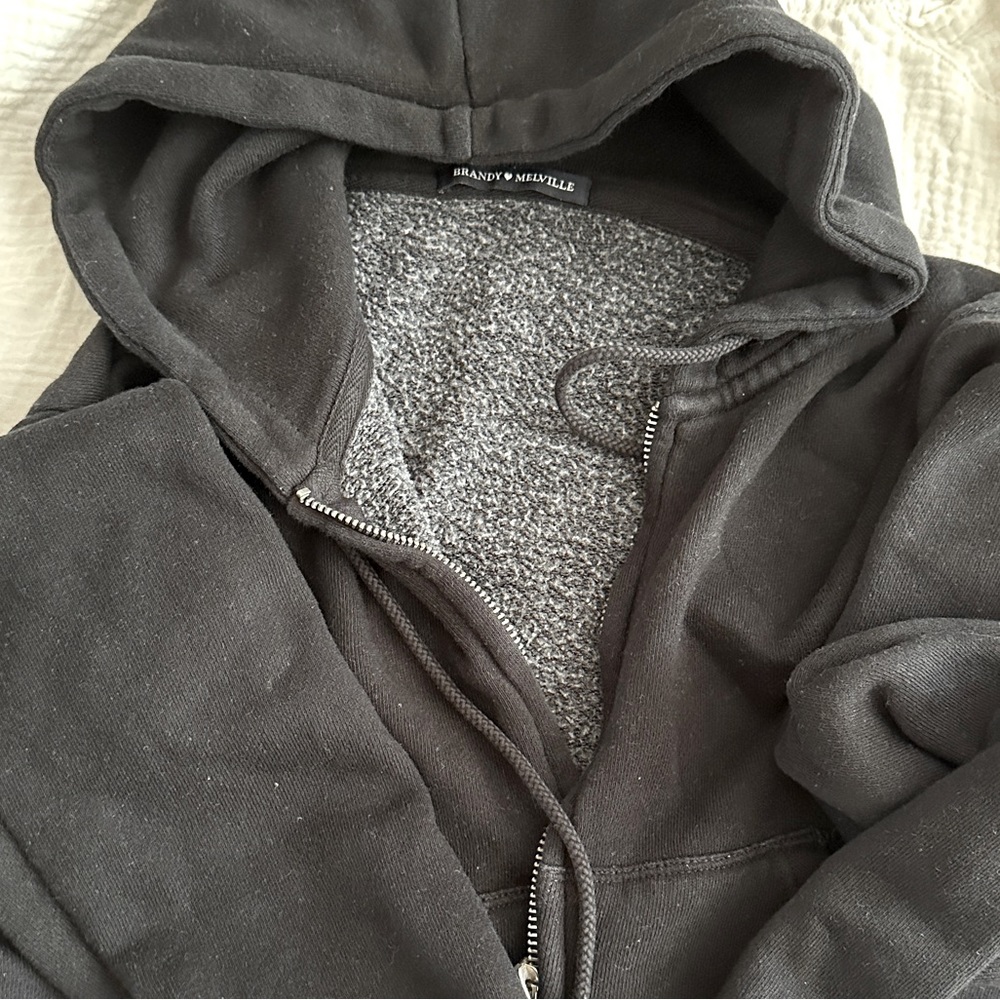 Brandy Melville Crystal Hoodie
Like new
Color black 
Cropped black hoodie